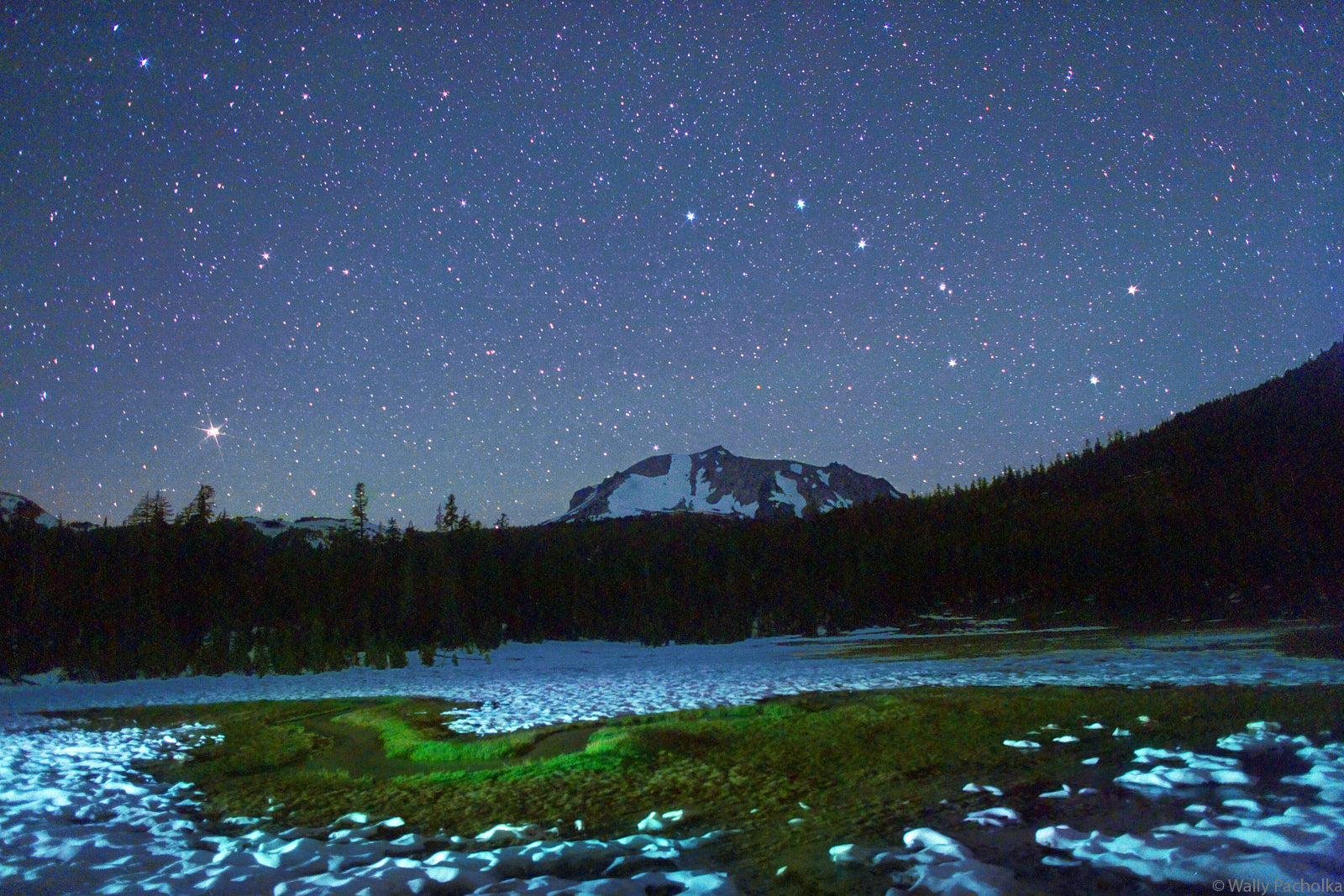 The Big dipper shines above Mount Lassen and Kings Creek.
